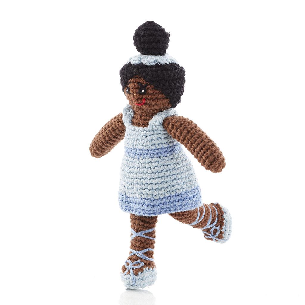 handmade and fair trade ballerina rattle in blue dress, blue ballet shoes with ribbons and dark skin